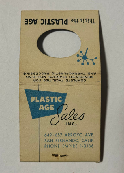 "Plastic Age Sales Inc." San Fernando, CA Vintage Feature Matchbook with a Knot-Hole Cover (B)